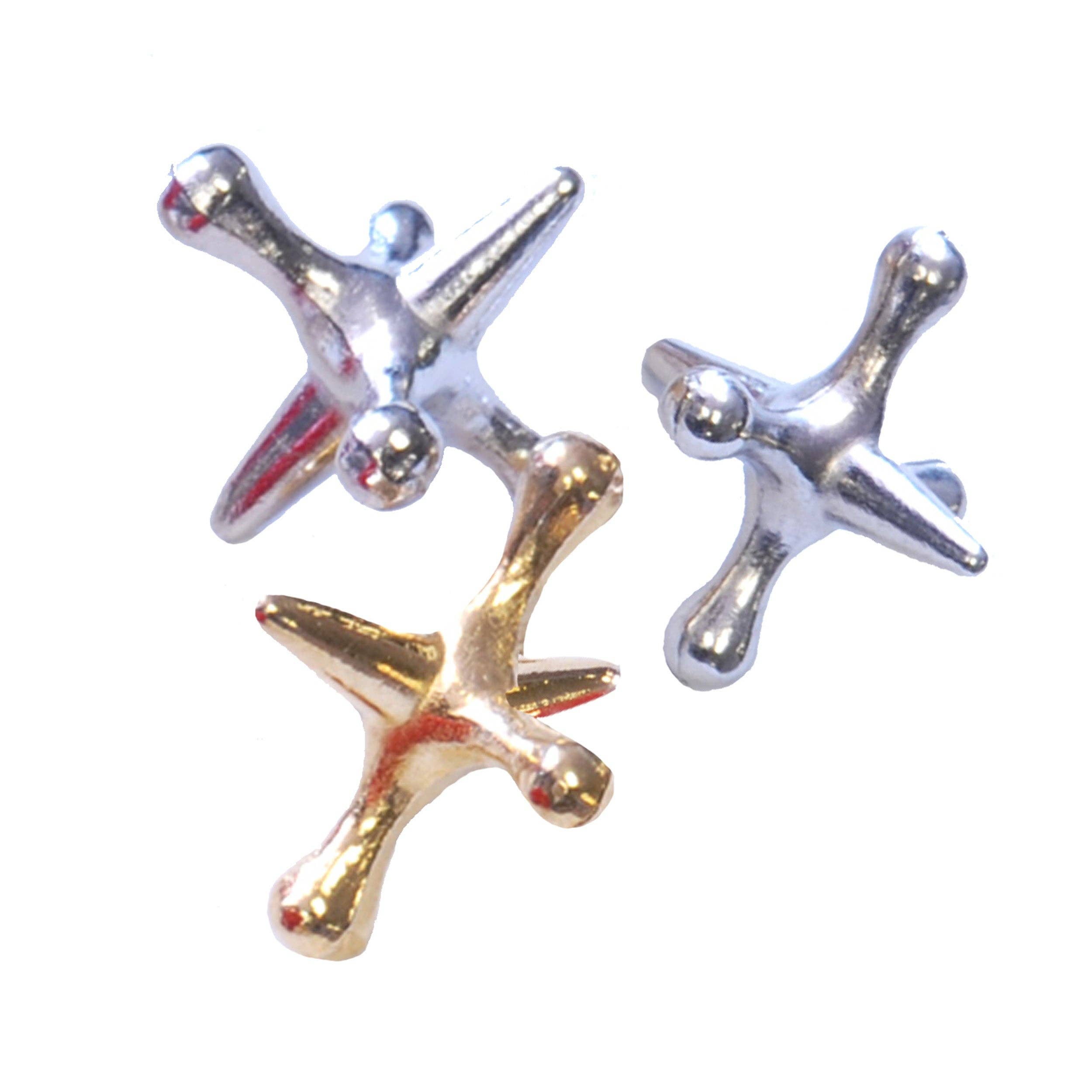 Old-Fashioned Metal Jacks in a Wooden Box